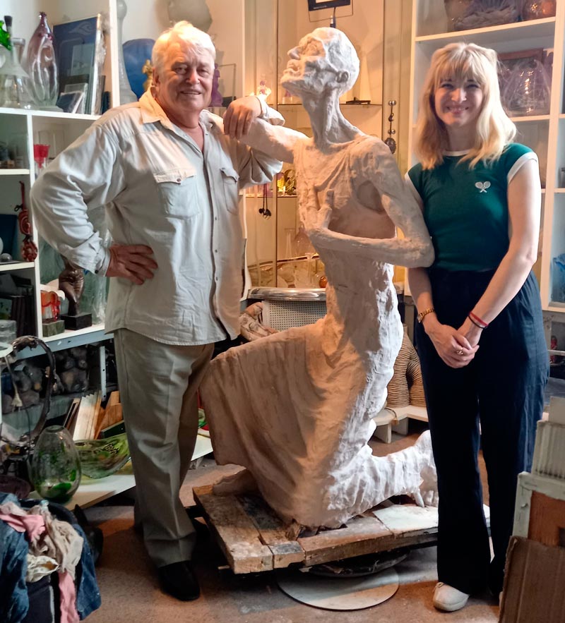 The Art of MFF | The Silent Uprising of an Angel by Sergey Melnikoff, a.k.a. MFF. American artist Sergey Melnikoff with his daughter Anastasia in the workshop beside the clay model of the sculpture "The Silent Uprising of an Angel."