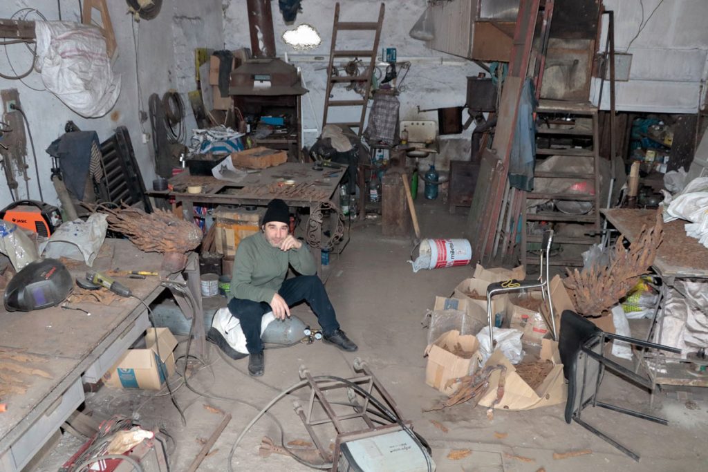 On the night of 19 December 2025, the artist’s studio was struck by the shockwave of a Russian Shahed drone that exploded just 20 metres from the building. The image shows Viktor Bielchyk amid the destruction left by the blast, bearing witness to the violence that reached even the place of creation.