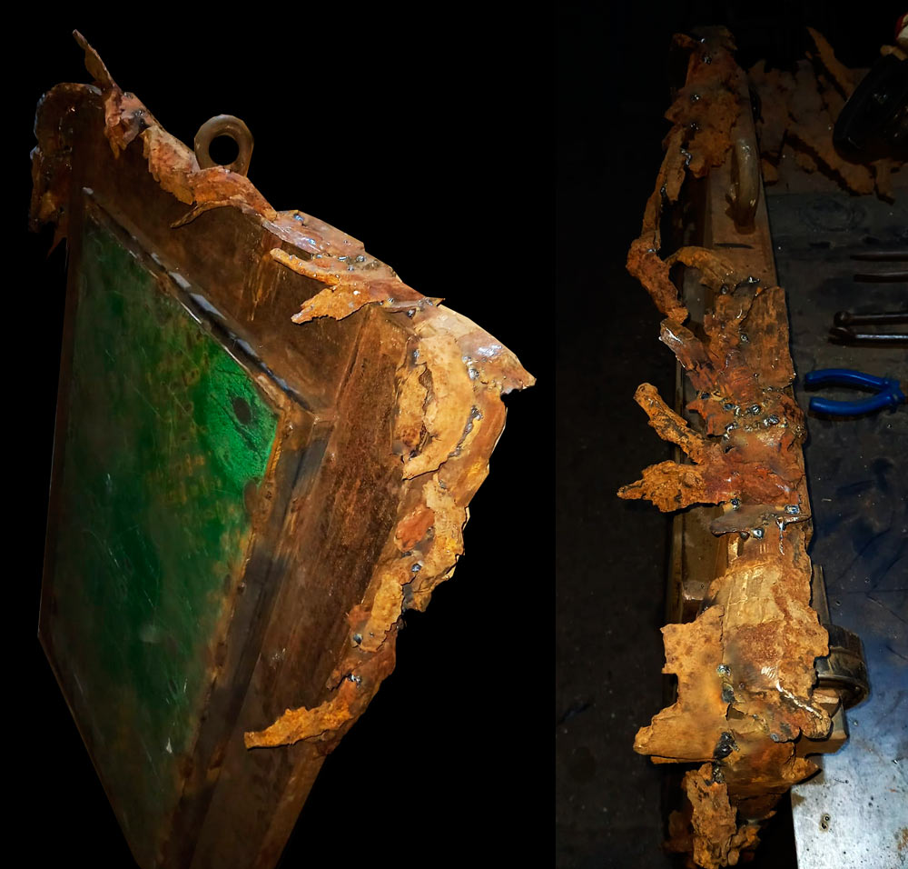 The Art of MFF | Beneath the Angel’s feet rises a welded perimeter — a dense, deliberate entanglement of curved metal fragments, later to be sealed in nickel by electroplating.