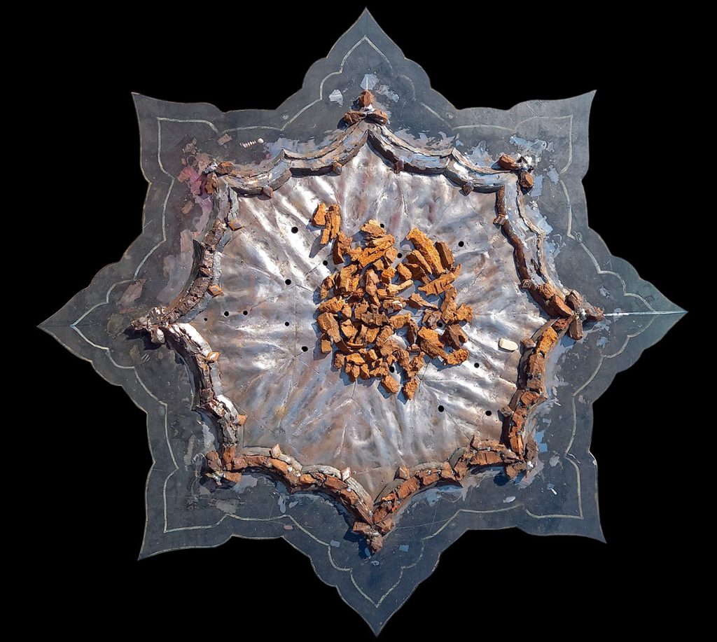 Small fragments are assembled into the desired form, each one carefully welded in place by hand.