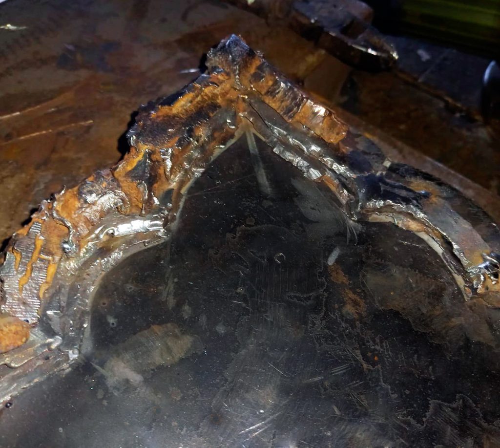 On the inner side, the frame is constructed in three stepped tiers, with the first two layers formed from flat fragments.