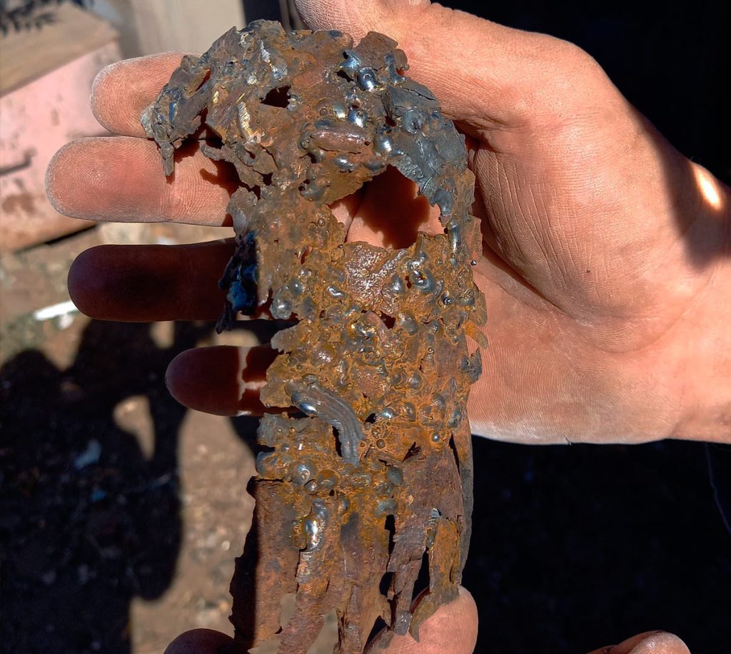 The Art of MFF | From several hundred tiny fragments, half of the Christ figure’s face begins to emerge..