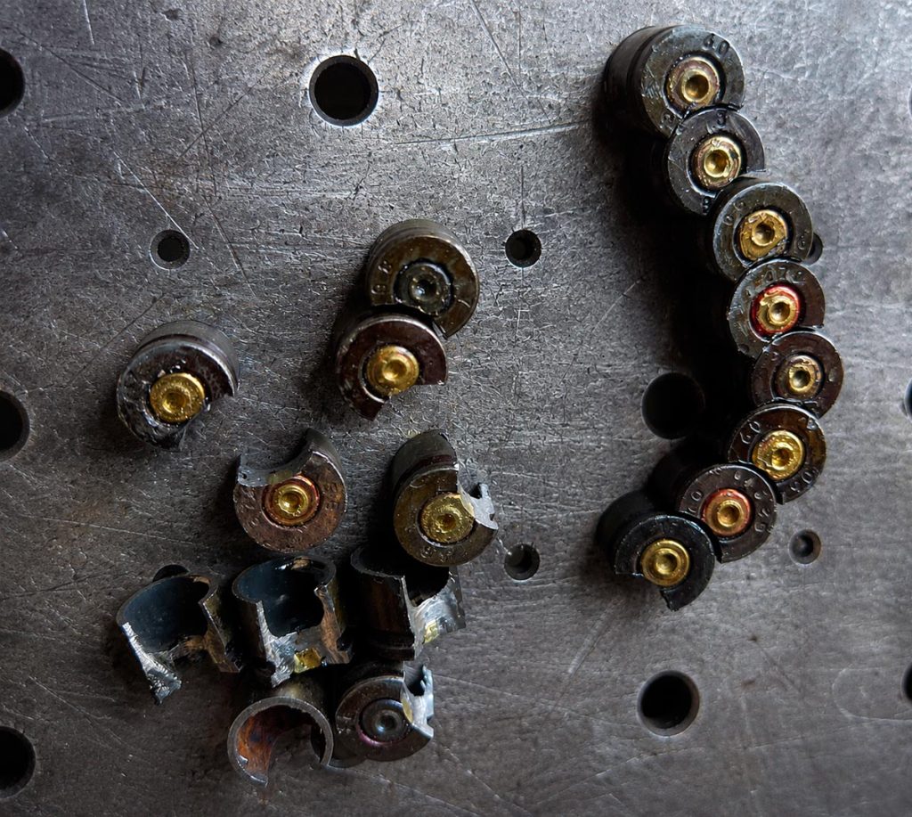 Each cartridge casing undergoes precision turning and milling in order to achieve a dense arrangement within the intricate ornamentation of the sculptural composition.