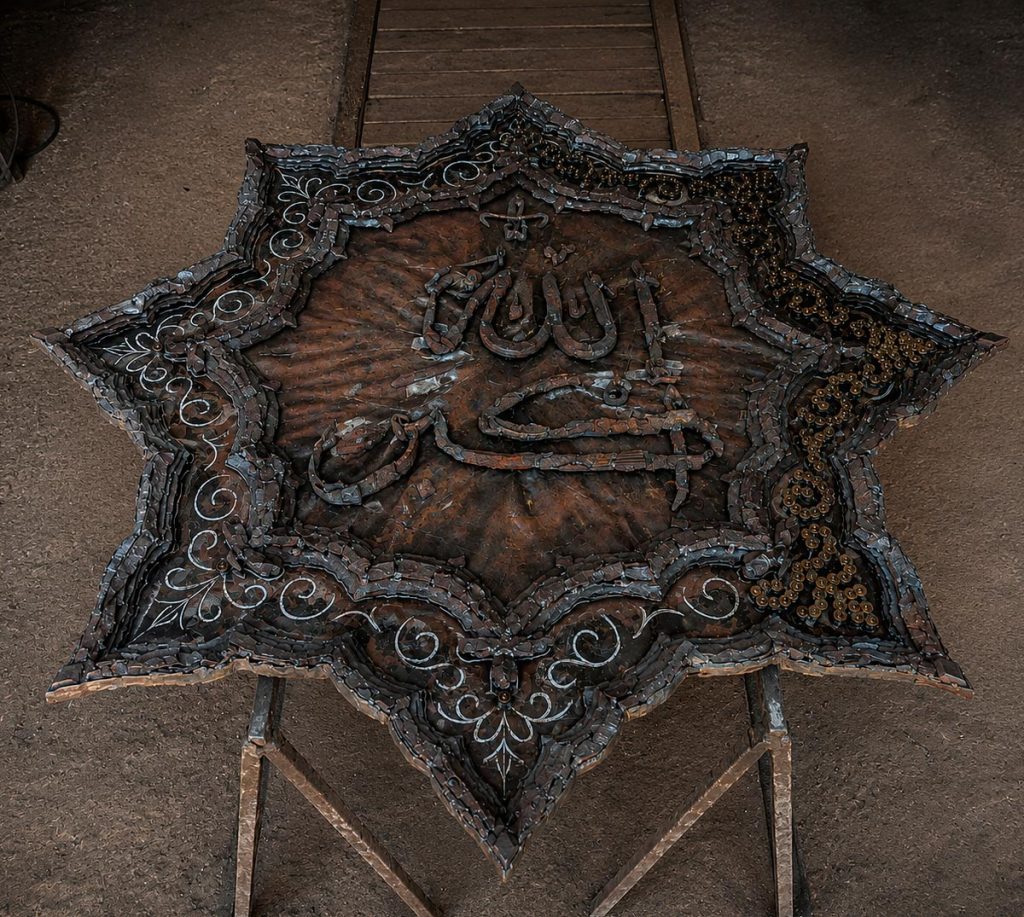 “Allah al-Akbar” during assembly in Odesa, Ukraine, before undergoing gilding and nickel finishing.